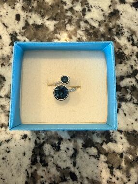 Swarovski Silver-Tone Twisted adjustable Band Ring with Navy Blue Crystal